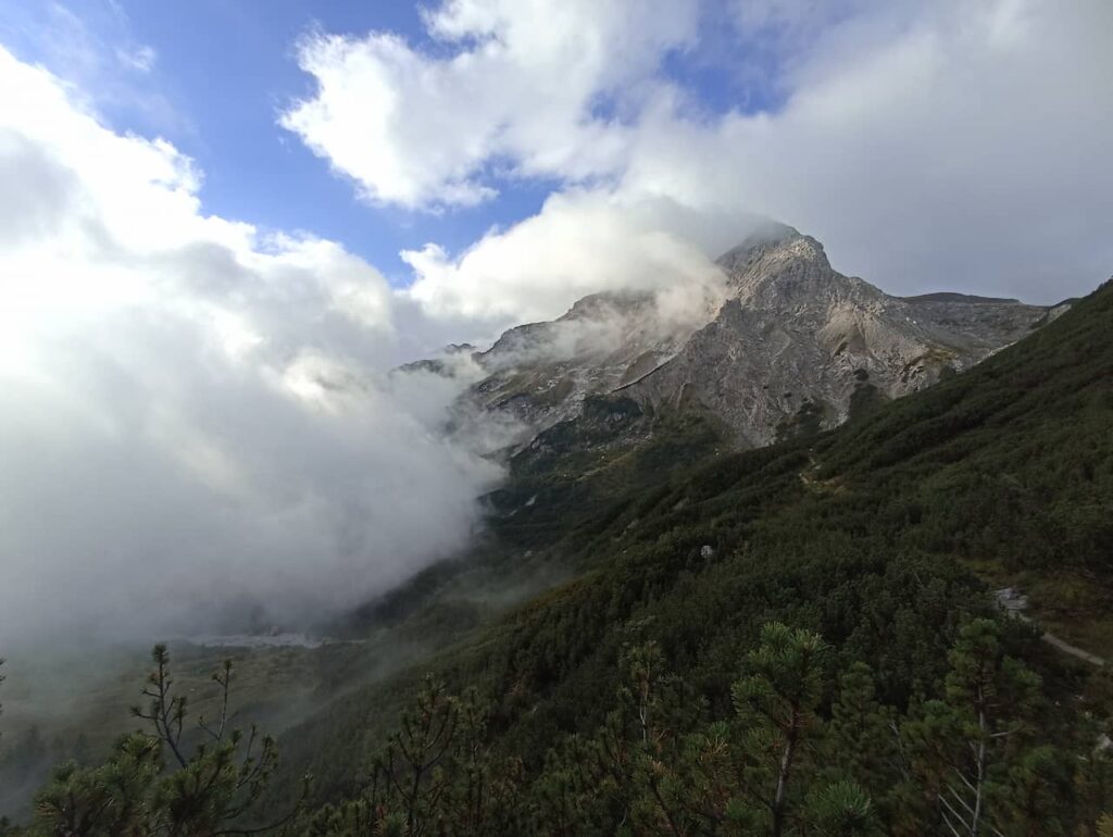 Climbing trail 514 with our target mountain in the clouds